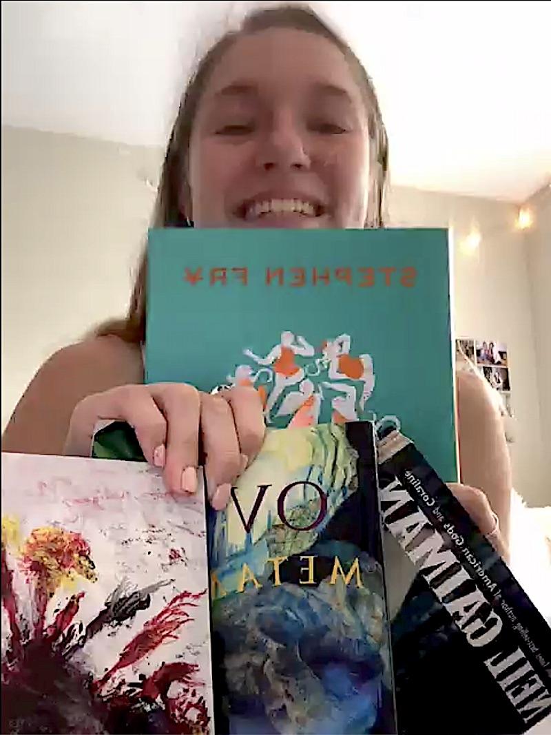 Brittney McKinley with some of her summertime reading